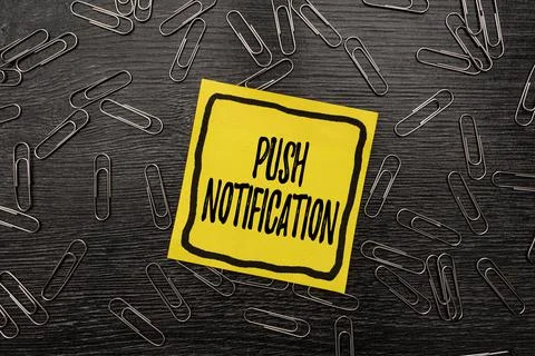 Hand writing sign Push Notification. Business idea automated message sent by an Stock Photos