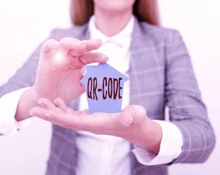 Hand writing sign Qr Code. Internet Concept the trademark for a type of matrix Stockfoto's