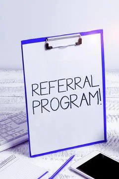 Hand writing sign Referral Program. Business approach sending own patient to Foto stock