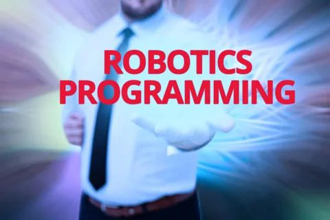 Hand writing sign Robotics Programming. Word Written on software that used to Fotos Stock