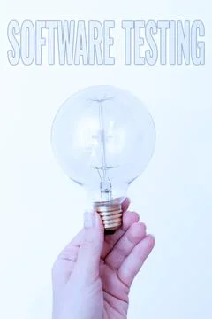 Hand writing sign Software Testing. Word Written on evaluate the functionality Stockfoto's