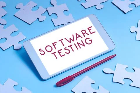 Hand writing sign Software Testing. Word Written on activity to check whether Stock Photos