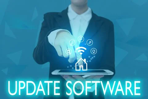 Hand writing sign Update Software. Conceptual photo replacing program with a Stock Photos