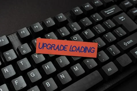 Hand writing sign Upgrade Loading. Concept meaning advancement of applications Foto stock