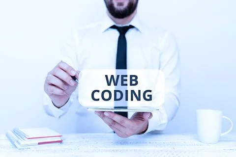 Hand writing sign Web Coding. Business concept a system of symbols and rules Stock Photos