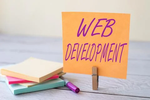 Hand writing sign Web Development. Word for dealing with developing websites for Foto stock