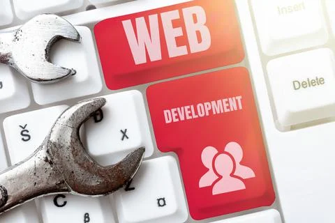 Hand writing sign Web Development. Business overview work involved in developing Stock Photos