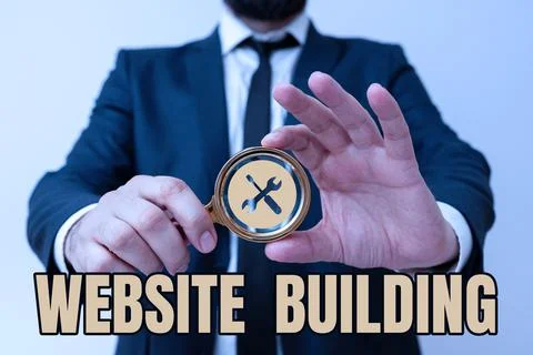 Hand writing sign Website Buildingtools that typically allow the construction of Foto stock
