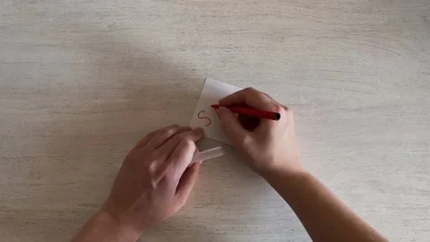 Hand Writing STOP on Sticky Note Red Marker Warning Concept Stock Footage 324702528