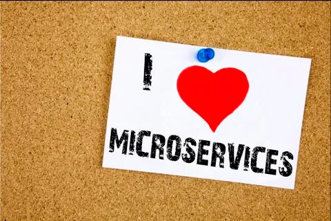 Hand writing text caption inspiration showing I Love Microservices concept me Stock Photos