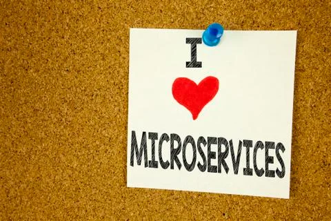 Hand writing text caption inspiration showing I Love Microservices concept me Stock Photos