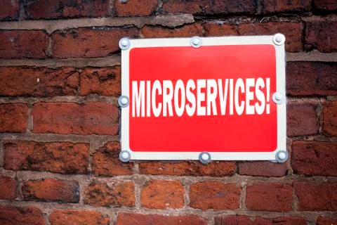 Hand writing text caption inspiration showing Microservices concept meaning M Stock Photos