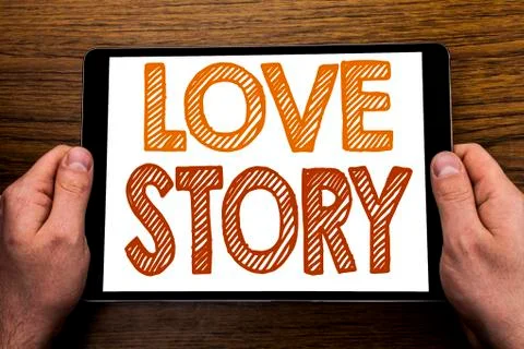 Hand writing text caption Love Story. Business concept for Loving Someone Hea Stock Photos