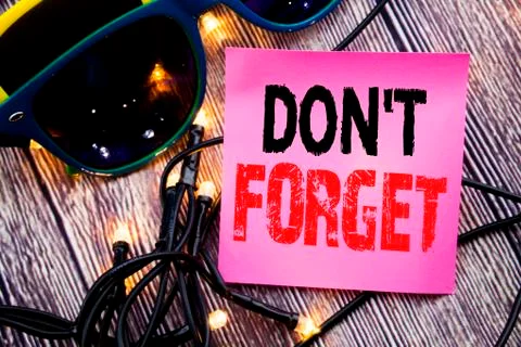 Hand writing text caption showing Do Not Forget. Business concept for Don t m Stock Photos