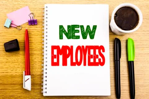 Hand writing text caption showing New Employees. Business concept for Welcome Foto stock