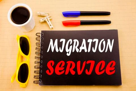 Hand writing text caption showing Migration Service. Business concept for Onl Stock Photos