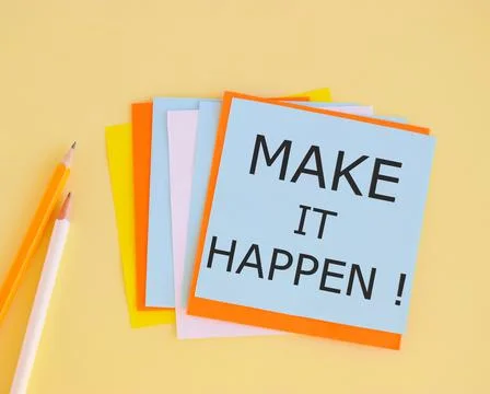 Hand writing the text Make Ideas Happen. Inspiration and support concept, clo Stock Photos