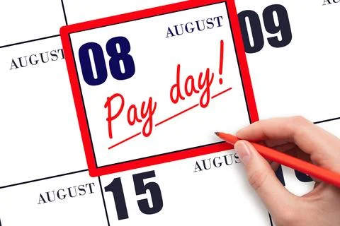 Hand writing text PAY DATE on calendar date August 8 and underline it. Paym.. Stock Photos