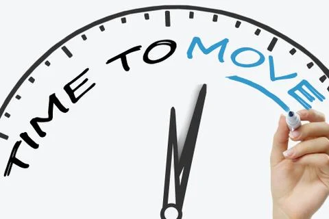 Hand writing Time to move concept with blue marker on transparent wipe board Stock Photos