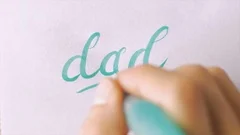 https://images.pond5.com/hand-writing-word-dad-cursive-footage-093034770_iconm.jpeg