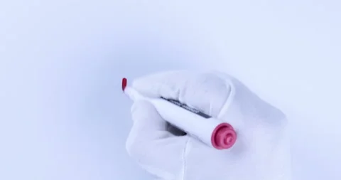 Hand writing the word IDEA on white blackboard Stock Footage 128643345