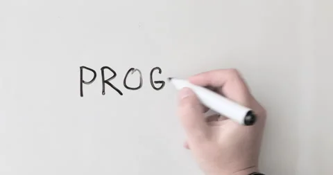 Hand writing the word PROGRESS on white blackboard Stock Footage 164444442