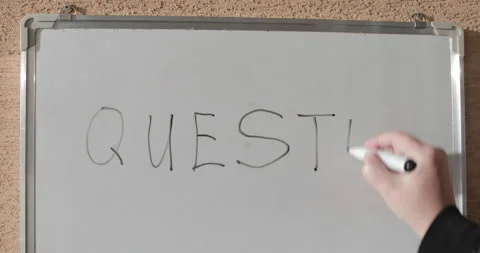Hand writing the word QUESTION on white blackboard Video stock 164444982