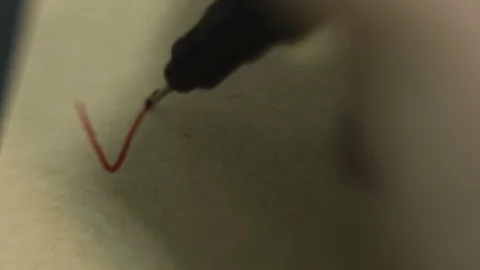 Hand writing the word Work on a brown stick note. Stock Footage 105654838