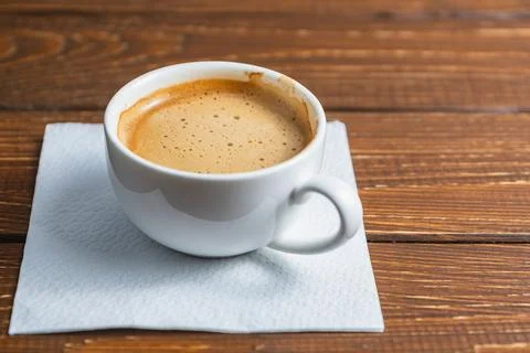 Hand written note on a coffee stained napkin with an empowe Stock Photos