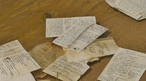 Hand-Written Paper is Floating on the Water Manuscripts of "olesya" Novelette Stock Footage