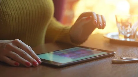 Hand of young girl using finger for touching keyboard tablet computer pc Stock Footage 72308881