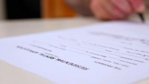 Hand of young man enters data in the residential rental application in the US Stock Footage 231684308