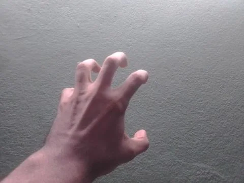 Hand of Young Man Stock Photos