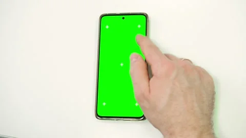 Hand of young man using mobile phone with green screen Stock Footage 301864882