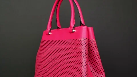 Handbag on black background. Concept for website ladies' accessories - no logo Stock Footage 72547320