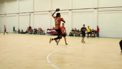 Handball Player Scores After Fast Break During Official Match Video stock 336932887