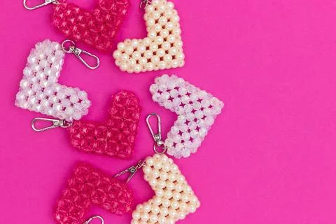 Handcracft keychains in a heart shape made from acrylic beads. Stock Photos
