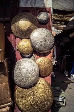 Handcrafted hammered metal objects and artifacts in Fes souk Stock Photos