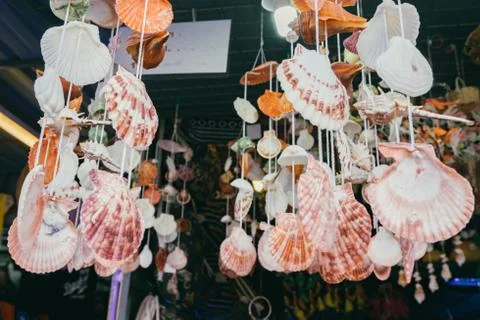 Handcrafted, hanging curtains made of shells for sell as souvenir at Nipah Ba Stock Photos