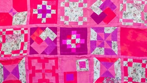 Handcrafted pink cloth stitched in patchwork Stock Photos