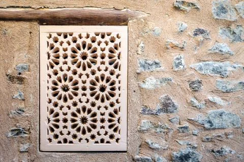Handcrafted Window on Stone Wall Fotos Stock