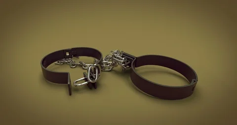 Handcuff falling down with chaines, alpha channel Stock Footage 87566235