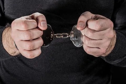 Handcuffed Stock Photos