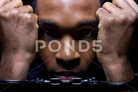 Handcuffed Stock Photos