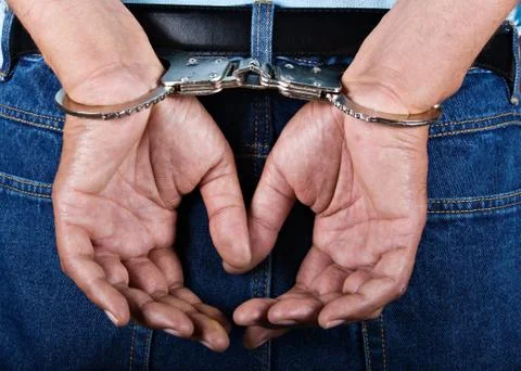 Handcuffed Stock Photos