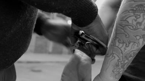 Handcuffing a man Video stock 51485653