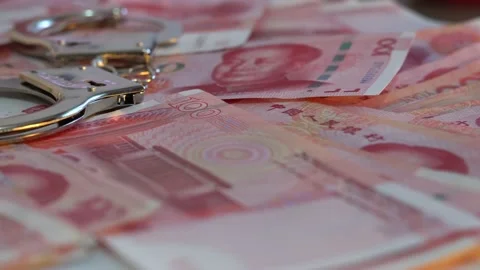 Handcuffs and RMB Stock Footage 159773885