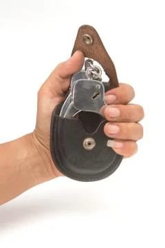 Handcuffs with hand Stock Photos