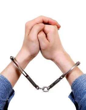 Handcuffs on a Hands Stock Photos
