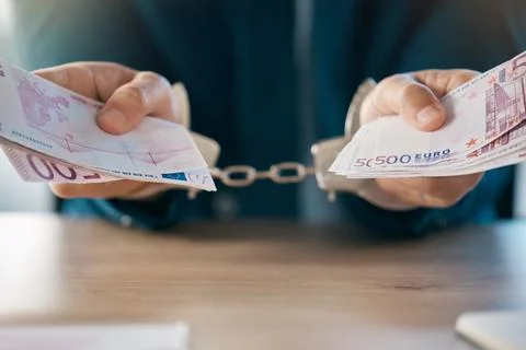 Handcuffs, justice and hands of businessman with euros arrested for fraud Stock Photos
